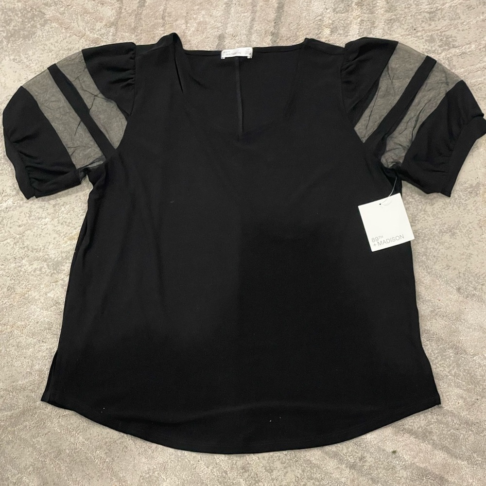 Black top with sheer sleeves